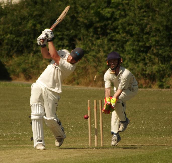 Llechryds John Curran is bowled by Hooks Aled Phelps